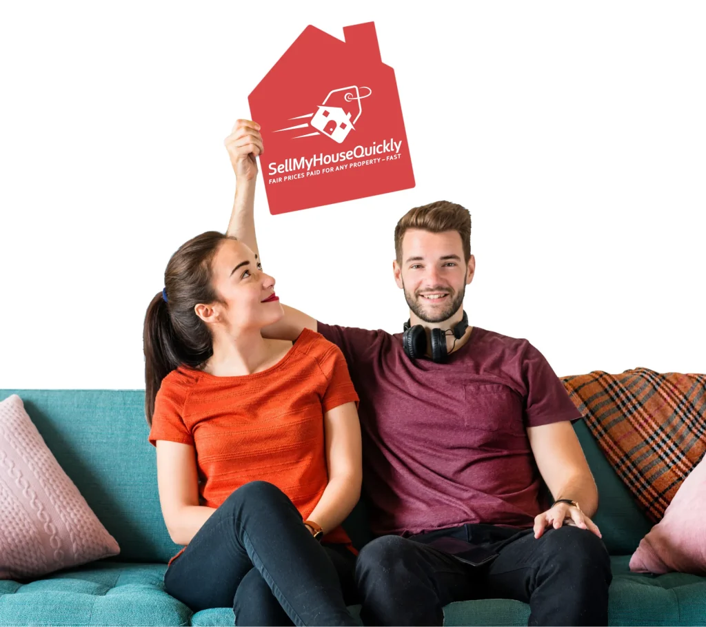 Couple Holding SMHQ Sign